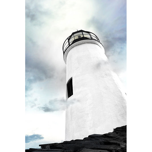 Image of The Sentinel photographic artwork by Jessica St. Clair looking upward from the rocky jetty to the top of a black and white lighthouse reaching toward an ethereal sky with artistic clouds
