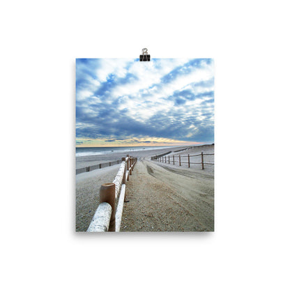 Image of Tomorrow's Promise photographic art print on 8 inch by 10 inch enhanced matte photo paper by Jessica St. Clair depicting a sandy fence-lined path to the sea with a colorful sky at dusk