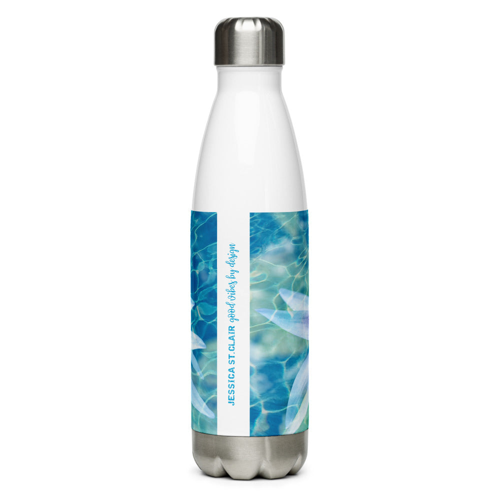 Image of back of 17 ounce stainless steel water bottle featuring Aqua Pura artwork design by Jessica St. Clair