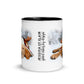 Image of center view of white ceramic mug featuring black inside and handle with photo of yellow lab puppy wearing lumberjack hat snoozing in the snow